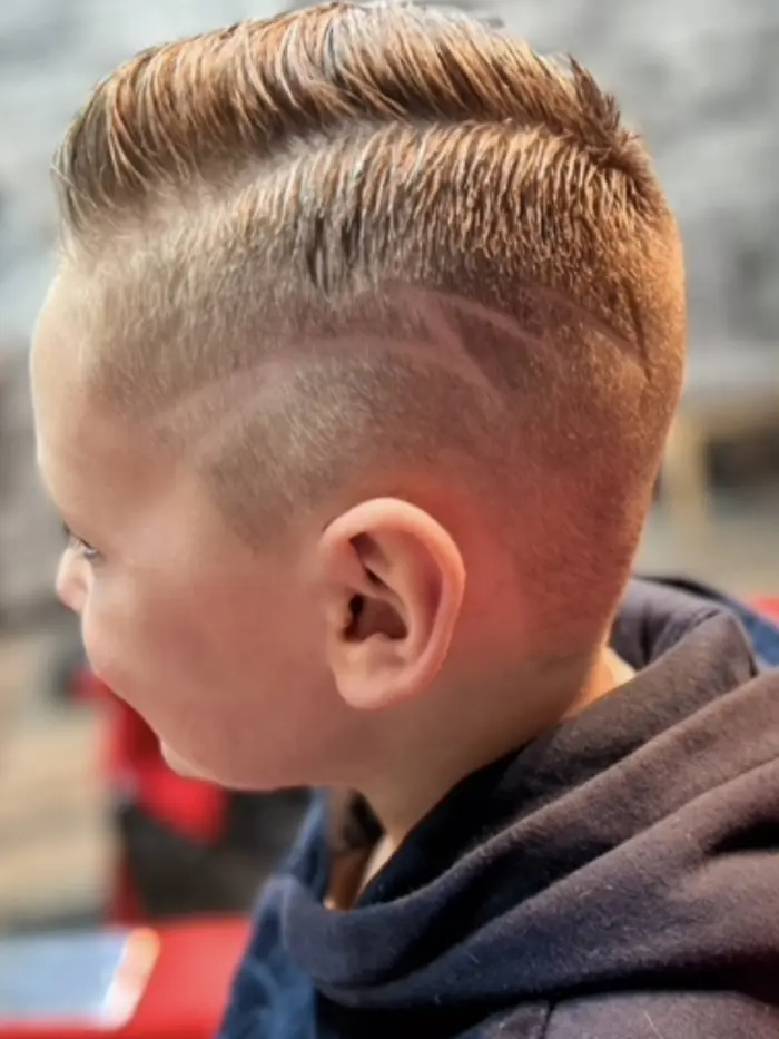 Boy's comb-over with double line design